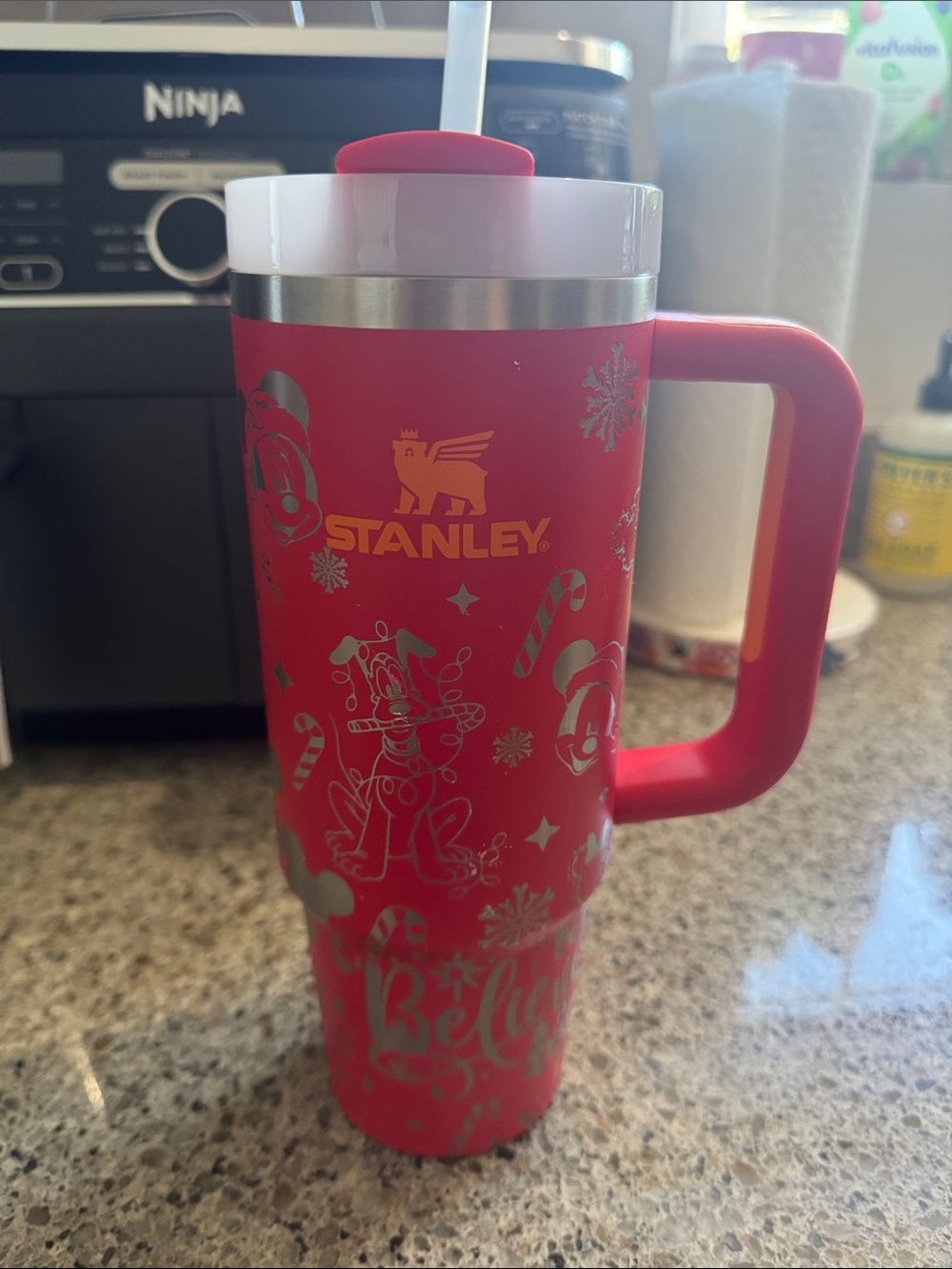 Stanley Red Holiday Travel Mug with Handle and Festive Graphics
